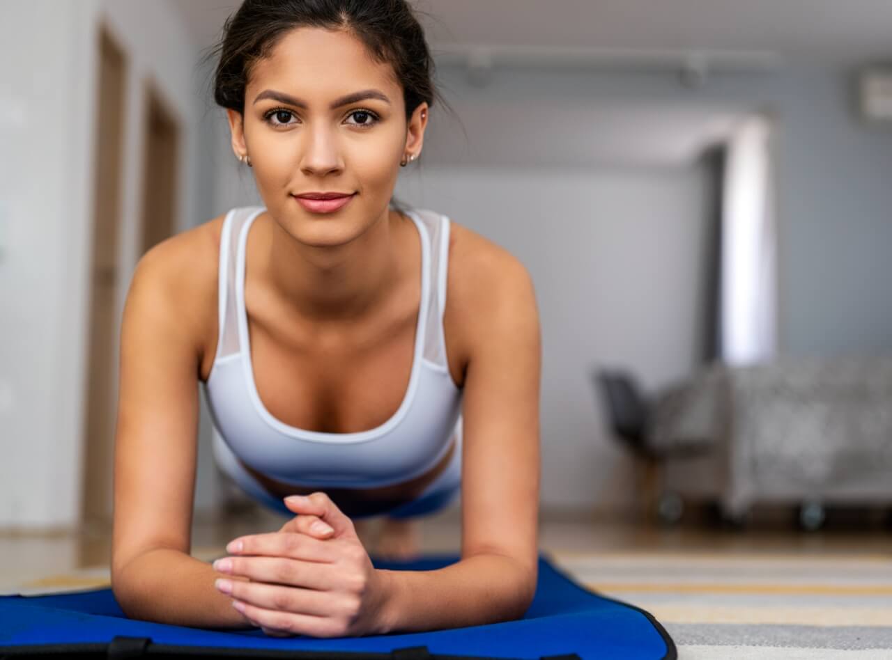 happy-fit-young-woman-exercising-at-home-healthy-2023-11-27-05-04-55-utc (2)
